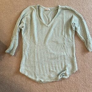 3/4 sleeve light weight v-neck sweater.